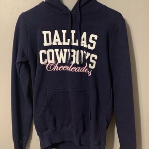 A Dallas cowboys (cheerleader) sweatshirt!